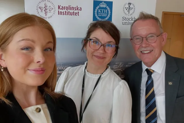 Photo of three people